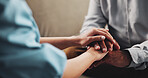 Holding hands, trust and psychologist with patient, mental health and empathy for trauma or helping. Clinic, people and support for client with depression, consultation and therapist with sympathy