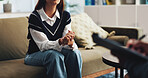 Therapy, anxiety and hands of psychologist on sofa for counseling, assessment and support. Mental health, advice and progress with people in office for therapist session, trauma recovery and help
