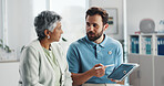 Tablet, talking and physiotherapy with old woman in office for consulting, healthcare and rehabilitation. Muscle recovery, medical and support with senior patient in clinic for physical therapy
