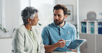 Buy stock photo Tablet, talking and physiotherapy with old woman in office for consulting, healthcare and rehabilitation. Muscle recovery, medical and support with senior patient in clinic for physical therapy