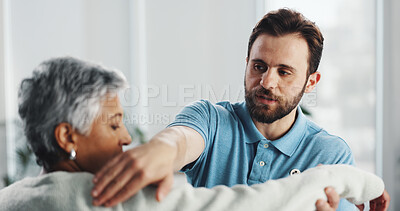 Buy stock photo Shoulder, stretching and physiotherapy with man in office for consulting, healthcare and rehabilitation. Muscle recovery, medical and support with senior patient for physical therapy and advice