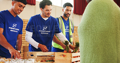 Buy stock photo Food bank, volunteer and donation for homeless person, poverty relief or community outreach. Charity, group or giving grocery for humanitarian aid, distribution or help for hunger with carrots at ngo