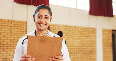 Buy stock photo Doctor, volunteer and portrait of happy woman with clipboard for charity or healthcare. Medical worker, smile and professional at ngo for wellness outreach, community or humanitarian aid in Palestine