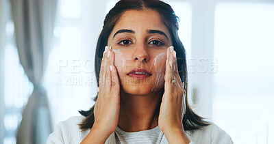 Buy stock photo Portrait, confident and woman with cream in home, smooth and facial treatment for skin or cosmetics. Glow, face and Indian person with skincare for beauty, dermatology and moisturiser in house