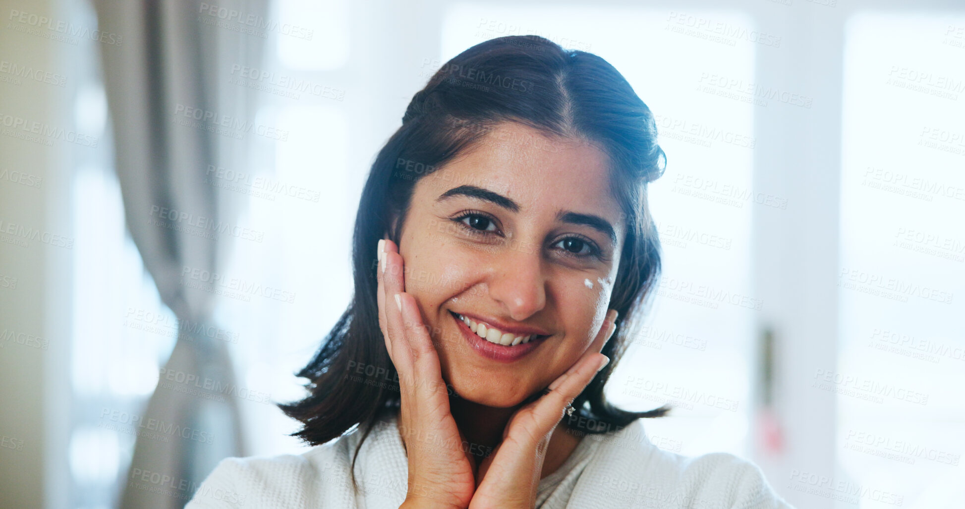 Buy stock photo Portrait, skincare and woman with cream in home, wellness or facial treatment for hydration of skin. Smooth, face and Indian person with cosmetics for beauty, dermatology and moisturizer in house