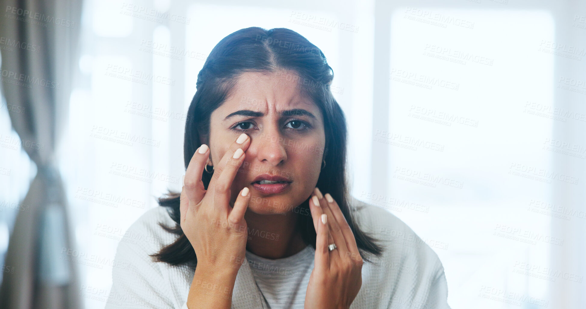 Buy stock photo Skincare, worry and woman with face check, home and beauty with wrinkle, stress or allergic reaction. Frustrated, concerned or girl with facial pimple search, dermatology or vacation sun damage