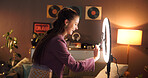 Influencer, happy and woman in home with ring light for social media, recording video and upload. Content creator, excited and person with audience for live streaming, subscription and broadcast