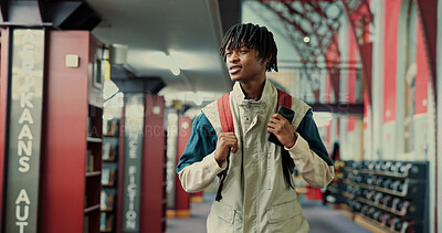 Buy stock photo Black man, student and walking with bag at library for education, learning or study at university. Male person, African learner or academic with backpack for literature, knowledge or development