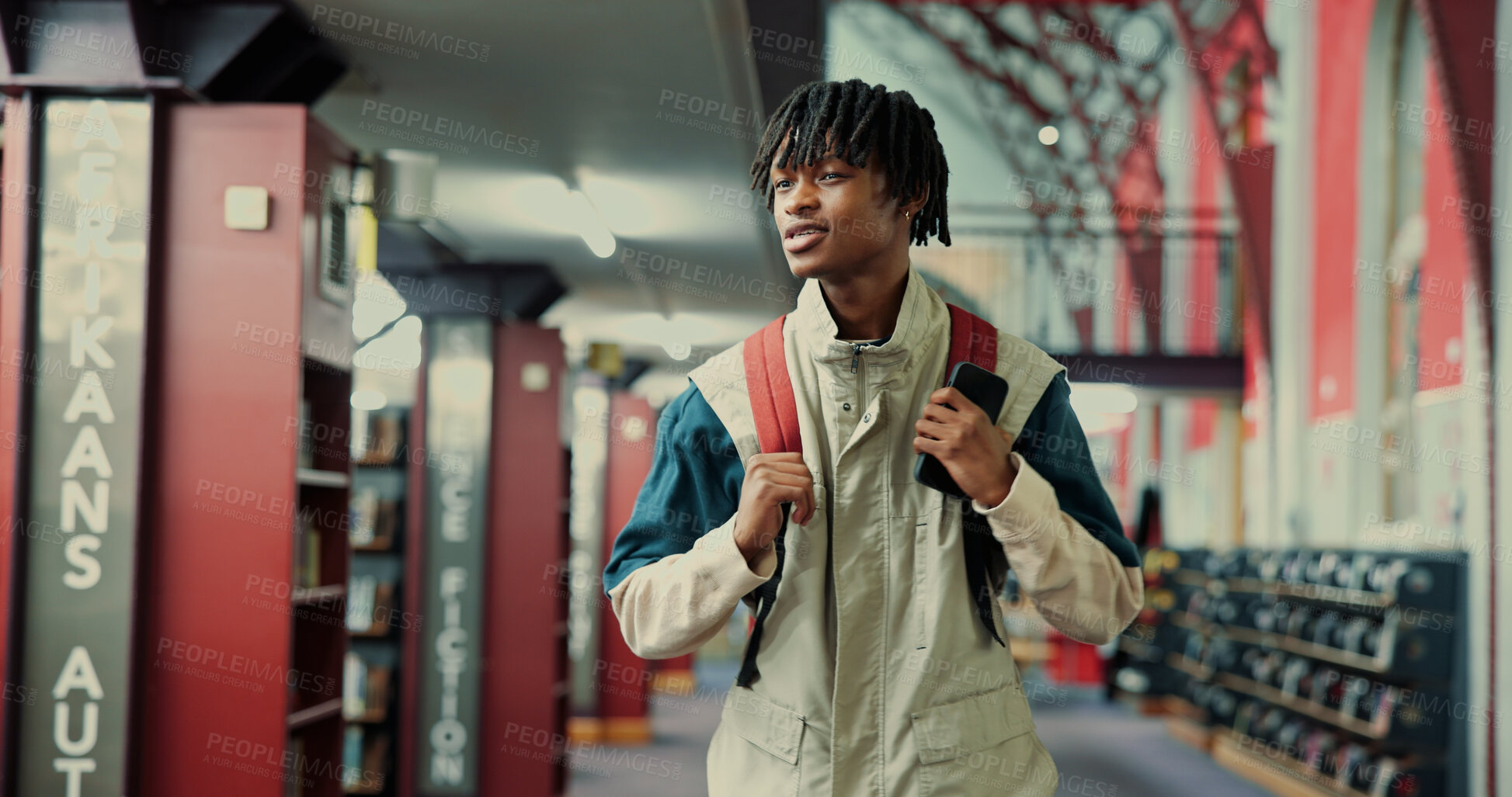 Buy stock photo Black man, student and walking with bag at library for education, learning or study at university. Male person, African learner or academic with backpack for literature, knowledge or development