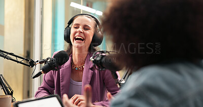 Buy stock photo Laugh, mic and woman with guest for podcast, interview and discussion for content creation. Influencer, live streaming and host with person for funny conversation, chat and  broadcast for talk show