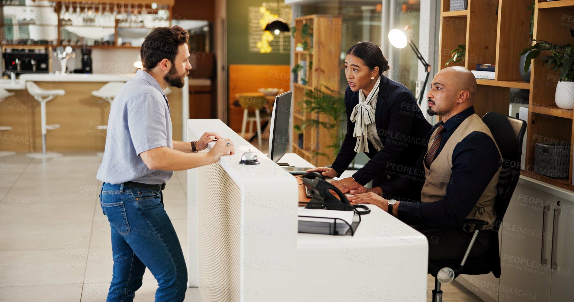 Buy stock photo Man, welcome and help desk at hotel with check in, talk and booking info for suite on vacation. People, concierge and client at counter for reservation, discussion and hospitality service at lodge