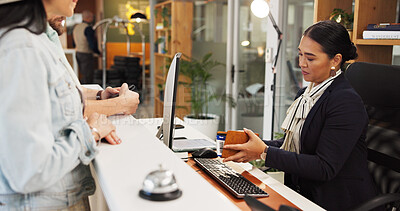 Buy stock photo Woman, passport and help desk at hotel with check in, ID and booking info for suite on vacation. People, concierge and paperwork at counter for reservation, welcome and hospitality service at lodge
