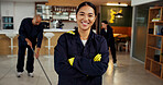 Girl, portrait and janitor with smile for maintenance job, hygiene and arms crossed with team in uniform. Pride, woman and cleaner with colleagues cleaning floors, overalls or confident at workplace