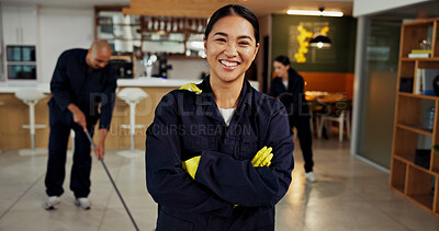 Buy stock photo Girl, portrait and janitor with smile for maintenance job, hygiene and arms crossed with team in uniform. Pride, woman and cleaner with colleagues cleaning floors, overalls or confident at workplace