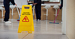 Cleaning, sign and caution for wet floor, business and people with equipment for hygiene or service. Board, information and warning for safety, disinfection and routine for sanitation of coffee shop
