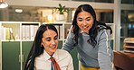 Night, business and women in office, help and communication for budget report. Evening, employees and cooperation in workplace, discussion and advice for economy analysis, smile and mentor with idea