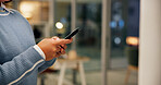 Hands, phone and businesswoman in office at night with communication for overtime on creative project. Networking, cellphone and magazine editor with mobile app for contact with publishing deadline.