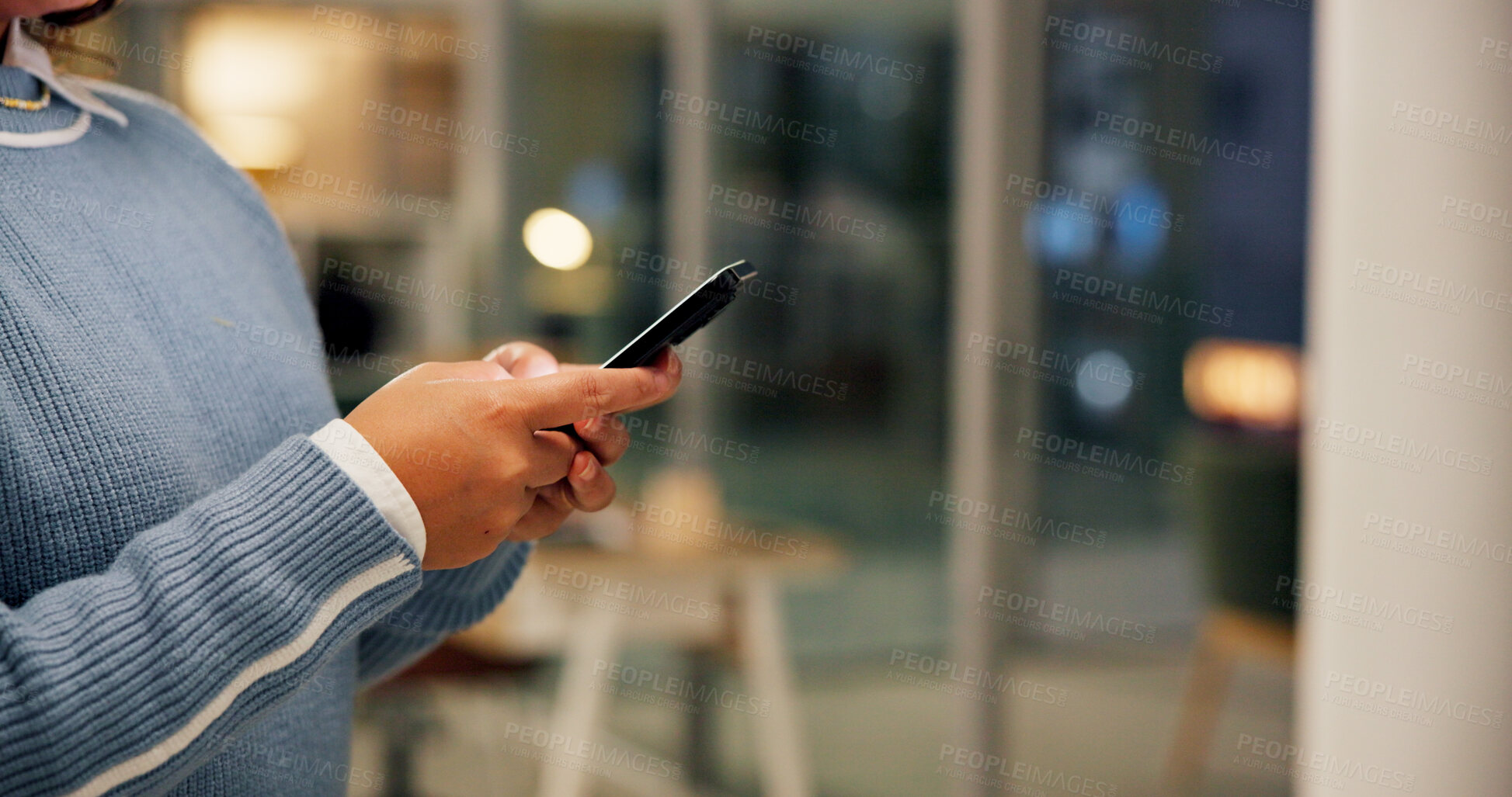 Buy stock photo Hands, phone and businesswoman in office at night with communication for overtime on creative project. Networking, space and magazine editor with mobile app for contact with publishing deadline.