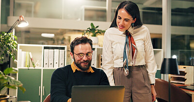 Buy stock photo Business, people and discussion with laptop in office for blog review, working late and feedback. Night, editor and content writer with tech for publication advice, article proofreading and coworking