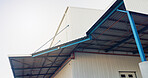 Roof, warehouse and building with sky outdoor for commerce, dropshipping and storage. Below, industrial and property with exterior of logistics factory, courier business and structure of distribution