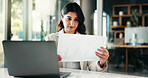 Business woman, accountant and statistics with laptop for financial review or performance at office. Female person, documents and analyst with computer, graph or chart for company report at workplace
