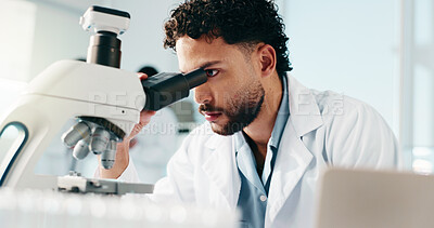 Buy stock photo Lab, scientist and man with microscope, analysis and study for drug development or cure for disease. Clinic, medical professional and person with tech for healthcare, pharmacologist and biotechnology