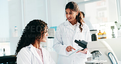 Buy stock photo Women, tablet and team at laboratory, planning and happy for report with medical research. People, application and feedback for pharma project with collaboration, innovation and smile for results