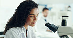 Woman, scientist and microscope for research study, microbiology innovation or pharmaceutical development. Science lab, investigation and doctor with drug analysis for assessment in medical industry