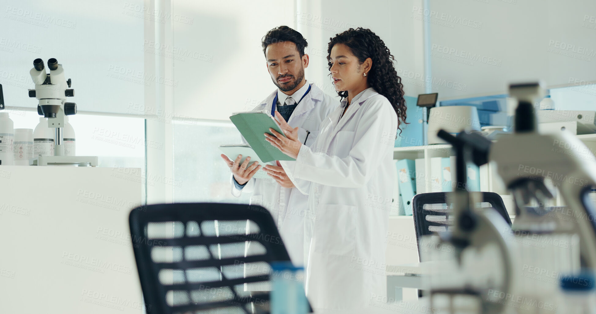 Buy stock photo Science, talking and people on tablet in lab for research, medical study and DNA analysis. Healthcare, teamwork and man with woman on digital tech for forensic review, biology and pathology report
