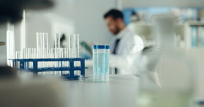 Buy stock photo Science, liquid and man with test tube in lab for chemical study, medical research and development. Healthcare, pharmaceutical and scientist with sample for forensic analysis, chemistry or experiment