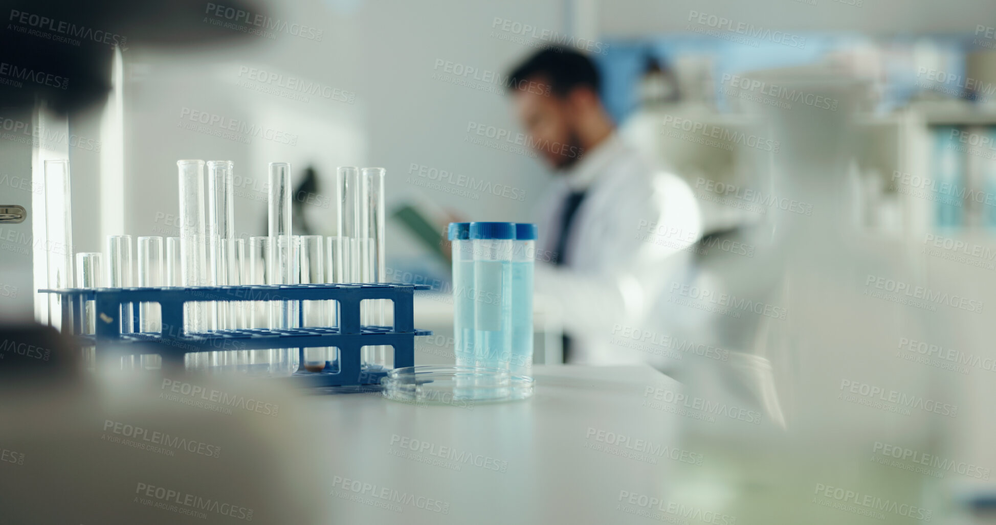 Buy stock photo Science, liquid and man with test tube in lab for chemical study, medical research and development. Healthcare, pharmaceutical and scientist with sample for forensic analysis, chemistry or experiment