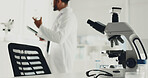 Microscope, man and scientist with tablet in lab for research, medical study and testing sample. Machine, person or biotechnology for experiment, dna production and confidence of vaccine breakthrough