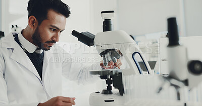 Buy stock photo Man, scientist and sample with microscope in lab for research, medical study and gene analysis. Male person, machine and particles with solution, dna production and confidence of vaccine breakthrough