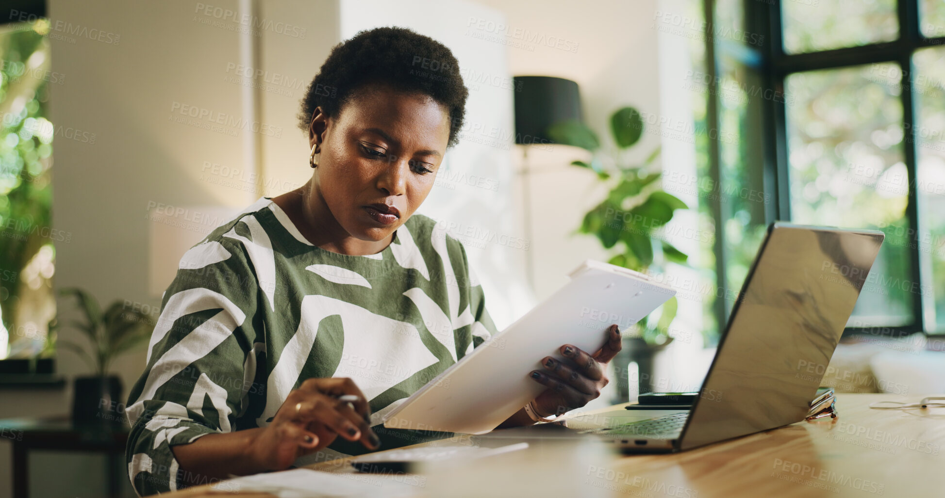 Buy stock photo Finance, documents and black woman with calculator in home for budget planning, taxes and rebate. Bookkeeping, laptop and person with clipboard for asset management, banking expenses and insurance