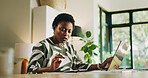 Budget, laptop and black woman with calculator in home for finance planning, taxes and rebate. Bookkeeping, documents and person with calculations for asset management, banking expenses and cash back