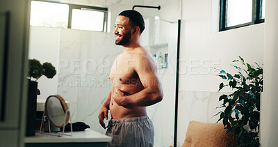 Buy stock photo Happy man, belly and weightloss in bathroom for personal care or self confidence at home. Male person, body and topless smile with stomach fat in satisfaction for morning routine or diet at house