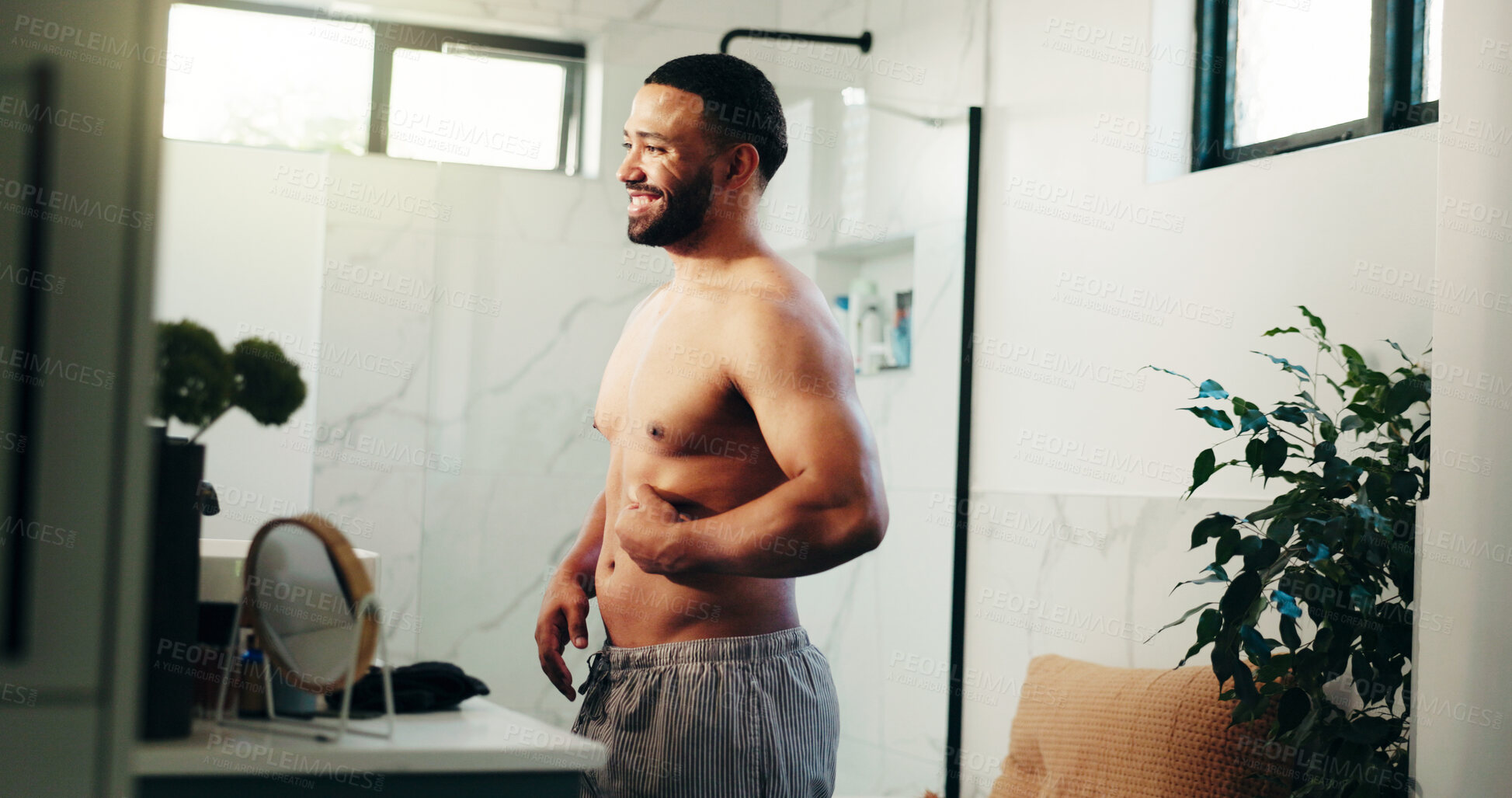 Buy stock photo Happy man, belly and weightloss in bathroom for personal care or self confidence at home. Male person, body and topless smile with stomach fat in satisfaction for morning routine or diet at house