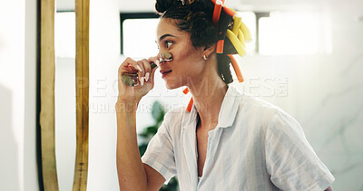 Buy stock photo Bathroom, beauty or girl with jade roller in mirror for grooming, lymphatic drainage or routine. Hair care, woman and cosmetics tool in home for skin circulation, skincare treatment and getting ready