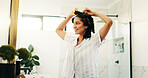 Hairstyle, curls and smile with woman in bathroom for self care, grooming and salon treatment. Beauty, hair tools and diy routine with person and curling rods in home for cosmetics, glow and growth