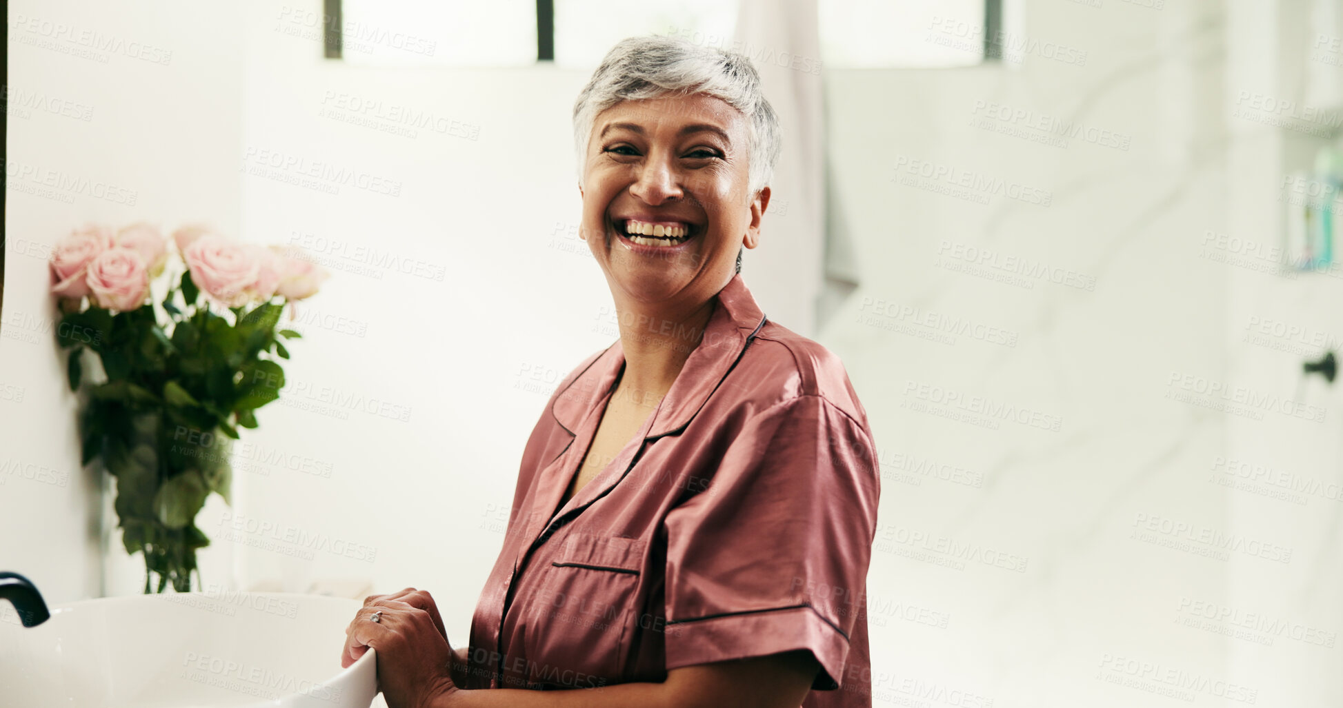 Buy stock photo Portrait, senior woman and laughing for skincare of grooming, facial or treatment in bathroom. Smile, elderly person or shine with natural beauty, dermatology progress and hydration benefits at house