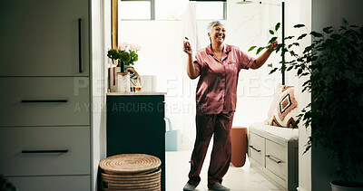 Buy stock photo Dance, energy and mature woman in bathroom for morning, skincare and excited routine. Beauty, jade roller and wellness with happy senior person in apartment for antiaging, dermatology or gua sha