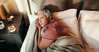 Buy stock photo Thinking, tired and fear with old woman in bed for insomnia, reflection and retirement. Fatigue, sleeping pills and memory with above of senior person in bedroom of home for mental health and idea