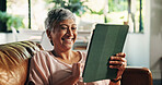 Senior, woman or laughing with tablet on sofa for funny video, social media meme or internet joke. Retirement, old person or relax with digital tech in home for streaming subscription or comedy ebook