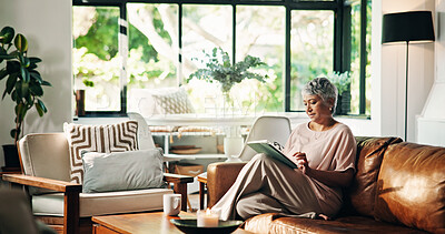 Buy stock photo Browsing, website and woman with tablet, relax and subscription on app for entertainment and online. Calm, mature person and scroll on social media for movies, streaming and choice for film in house