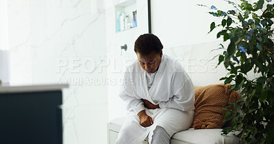 Buy stock photo Pain, black woman and stomach cramps in bathroom for menstruation, discomfort and PMS crisis. Morning, person and abdominal ache in home for digestion problem, uncomfortable bloating and constipation