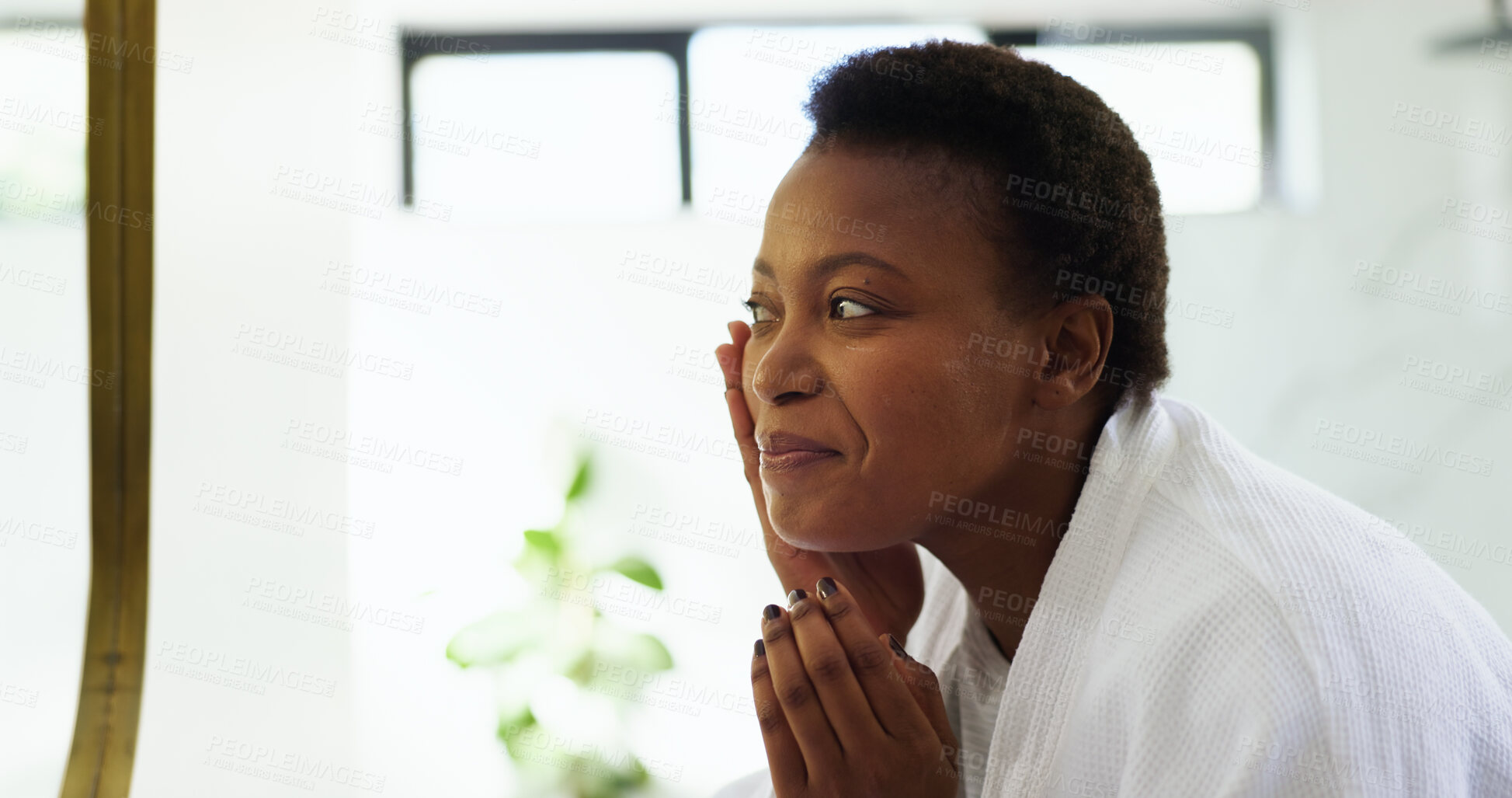 Buy stock photo Bathroom, beauty and woman with mirror, skincare and facial treatment for smooth skin or routine. Home, black person and dermatology for soft face, moisturizer and self care in morning or grooming