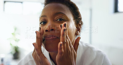 Buy stock photo Bathroom, skincare and woman with cosmetics, routine and facial treatment for smooth skin or beauty. Home, black person and dermatology for soft face, portrait and self care in morning or grooming