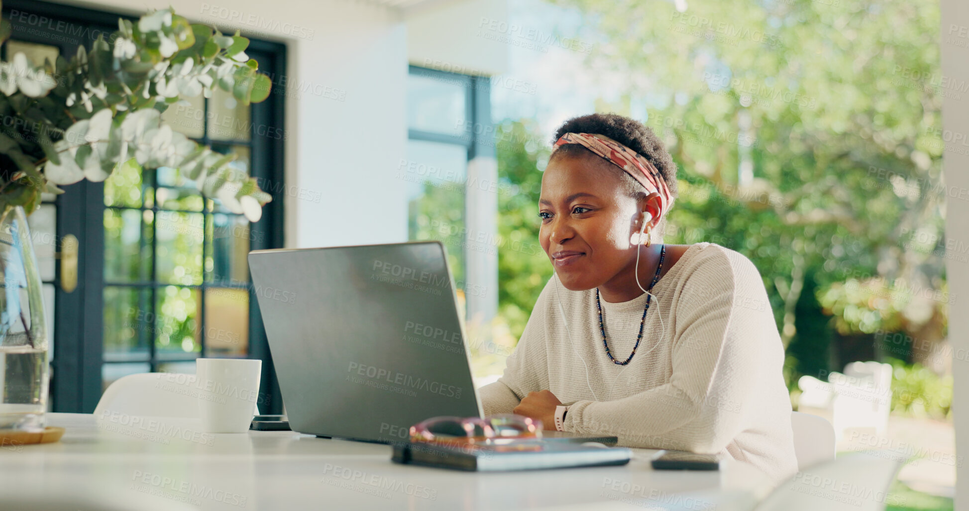Buy stock photo Laptop, house and black woman with earphones for remote work, creative career and copywriting. Backyard, music and person on computer for online review, writing article and digital magazine on patio