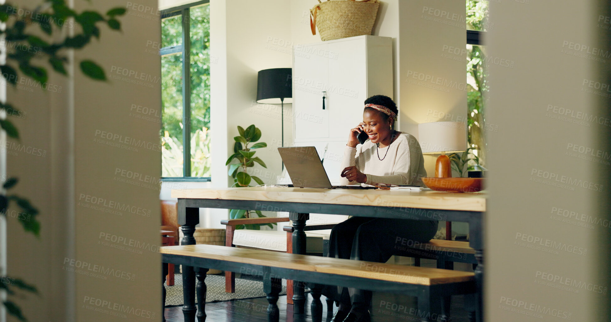 Buy stock photo Phone call, laptop and happy woman in home for remote work, virtual assistance and networking. Freelance, business and African person on computer and smartphone for communication, contact and talking