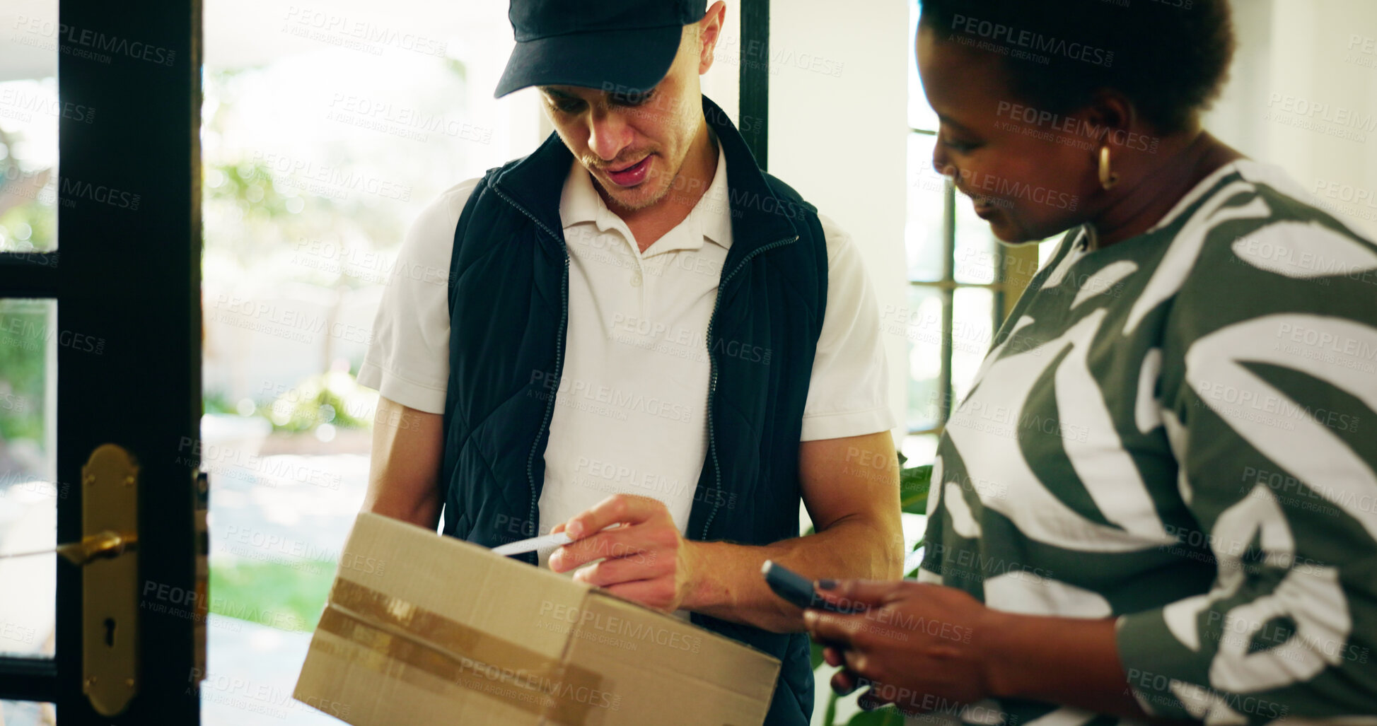 Buy stock photo Woman, courier and phone for box at front door, home and invoice for payment, deal or online order. People, delivery man and customer with package, info and ecommerce services with smile at apartment